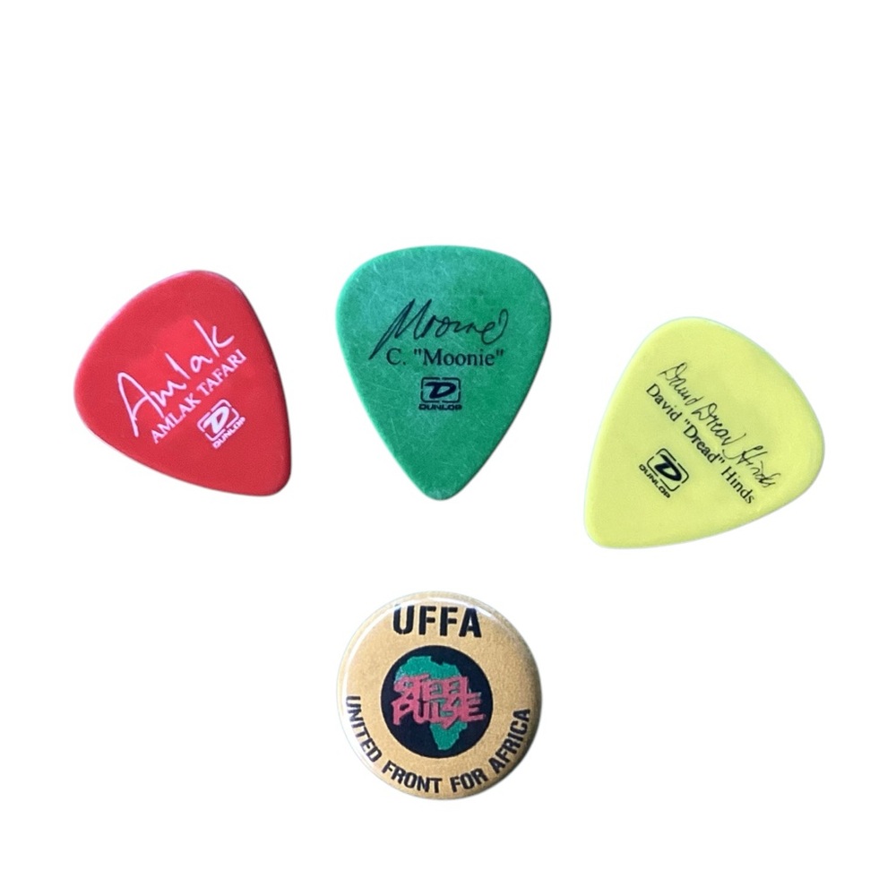 Steel Pulse Merchandise Reggae United Front for Africa pin and guitar picks